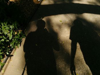 Shadow of people on wall