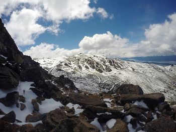 Scenic view of snowcapped mountains against sky