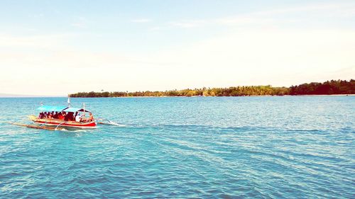 Boat sailing in sea