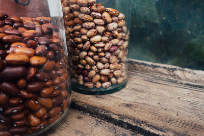 Close-up of roasted coffee beans on wood