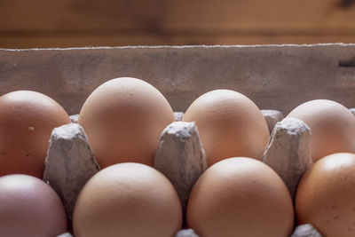 Close-up of eggs in crate