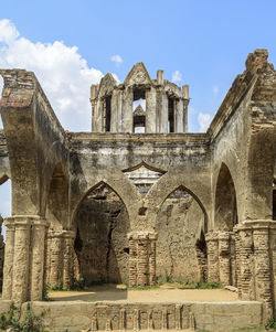 Low angle view of old building against sky