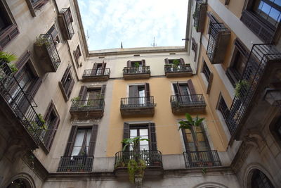 Low angle view of residential building against sky