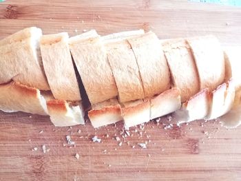 High angle view of bread on cutting board