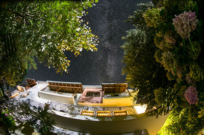 High angle view of swimming pool by lake in park