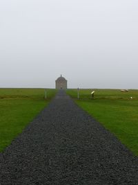 Built structure on land against clear sky