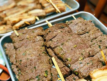 Close-up of meat on barbecue grill