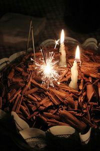 Close-up of burning candles