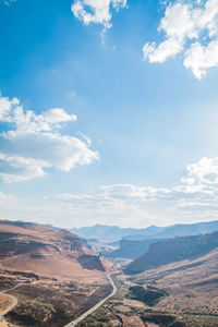 Landscape against cloudy sky