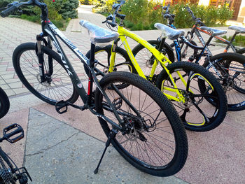 High angle view of bicycle parked on footpath