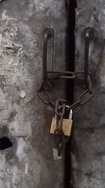 Close-up of padlock on door