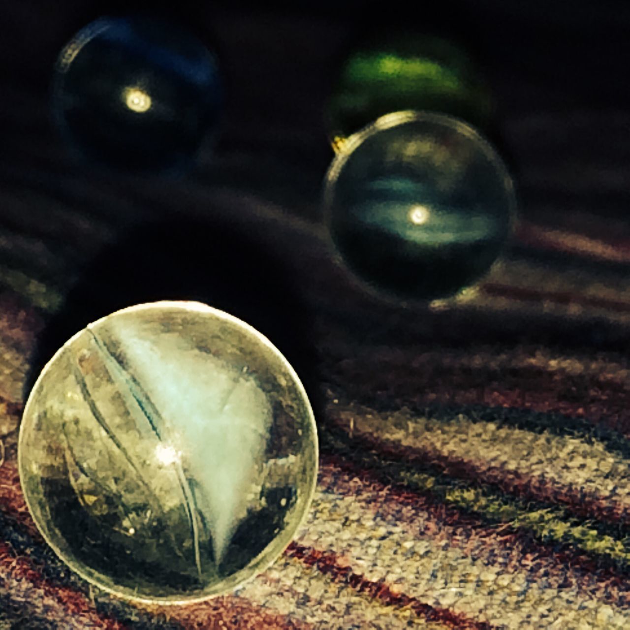 glass - material, transparent, close-up, focus on foreground, sphere, wineglass, indoors, reflection, glass, drinking glass, shiny, wine, still life, table, bubble, no people, drink, ball, light bulb, alcohol