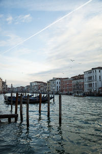 Grand canal against sky in city