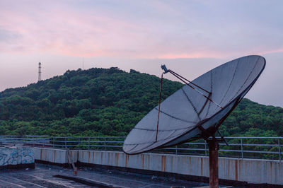 View of mountain range against cloudy sky