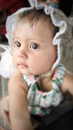 Close-up portrait of cute baby at home