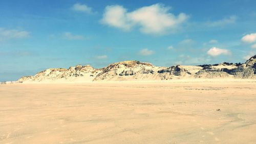 Scenic view of desert against sky