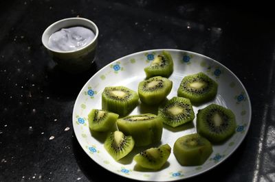 High angle view of fruits in bowl on table