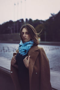 Portrait of woman standing in winter