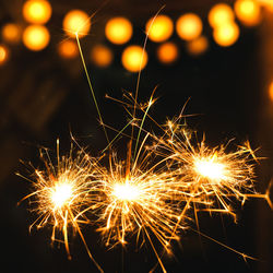 Close-up of firework display at night