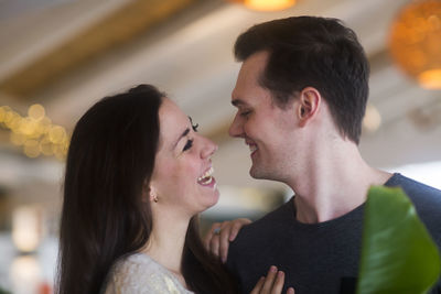 Young couple in a room in love