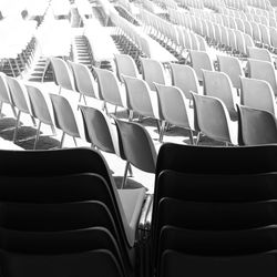 Empty chairs in stadium