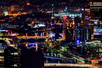 Illuminated cityscape at night