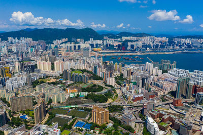 High angle view of buildings against sky in city