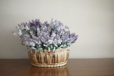 Flower vase on table