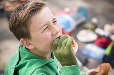 Close-up of boy eating food