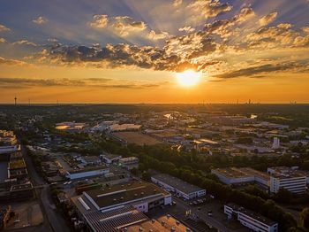 High angle view of townscape against sky during sunset