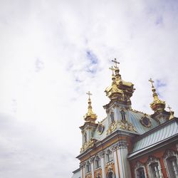 Low angle view of statue against sky