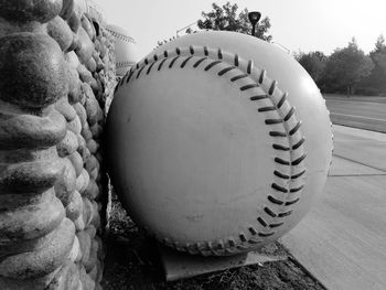 Close-up of ball balls on land against sky