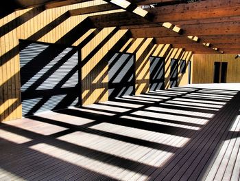 View of closed shutters with wood paneled floor