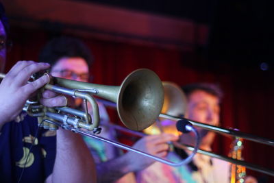 Men playing trumpets