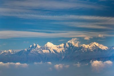 Scenic view of snowcapped mountains against sky