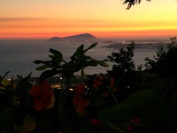 Scenic view of sea against sky at dusk