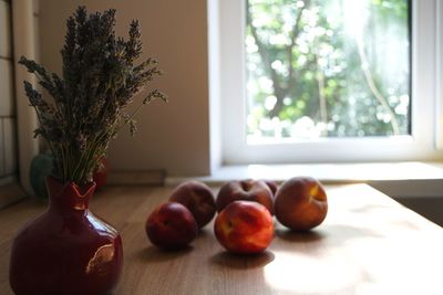 Close-up of fruits on table at home