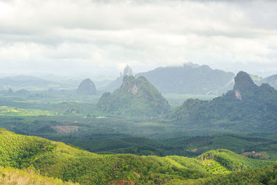 Beautiful hills and mountains scenery with morning atmosphere during rainy season.