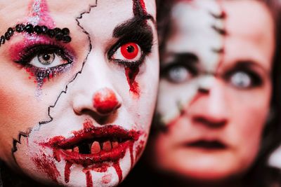 Close-up portrait of a serious, scary young woman