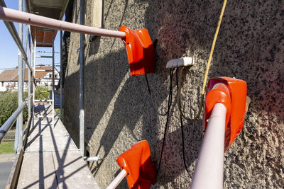 High angle view of red umbrella on street