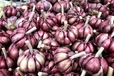 Full frame shot of garlic for sale at market stall