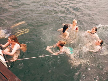 High angle view of people swimming in pool