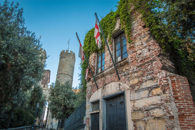 Low angle view of buildings against clear sky