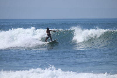 Man surfing in sea