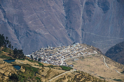 Aerial view of houses on mountain