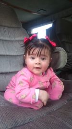 Portrait of cute girl sitting