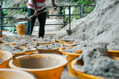 Low section of man working at construction site