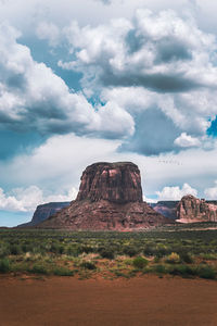 Rock mountain on landscape against sky