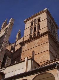 Low angle view of historic building against sky