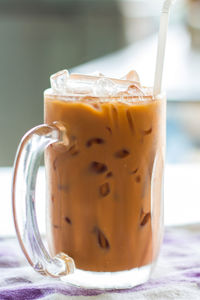 Close-up of coffee cup on table